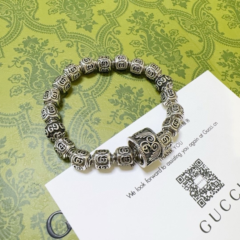 G*u*i bracelets